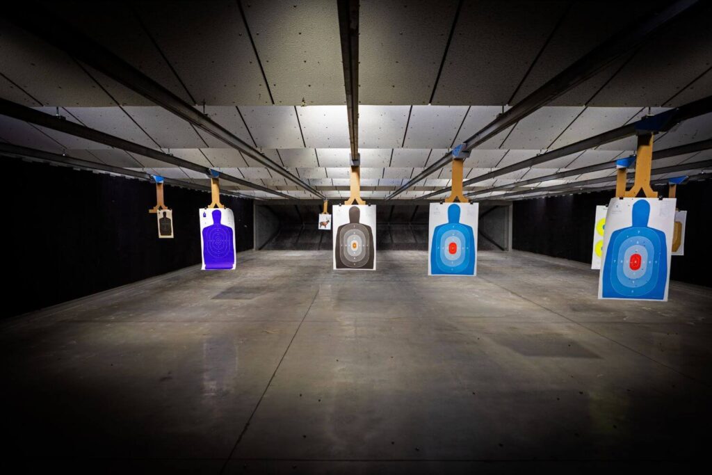 View of an indoor shooting range from a booth