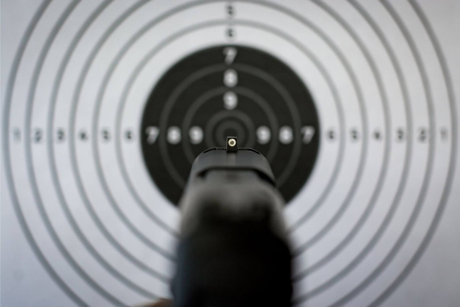 handgun pointed at a target