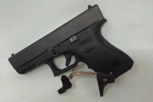 PR Triggers Model G components next to a custom pistol